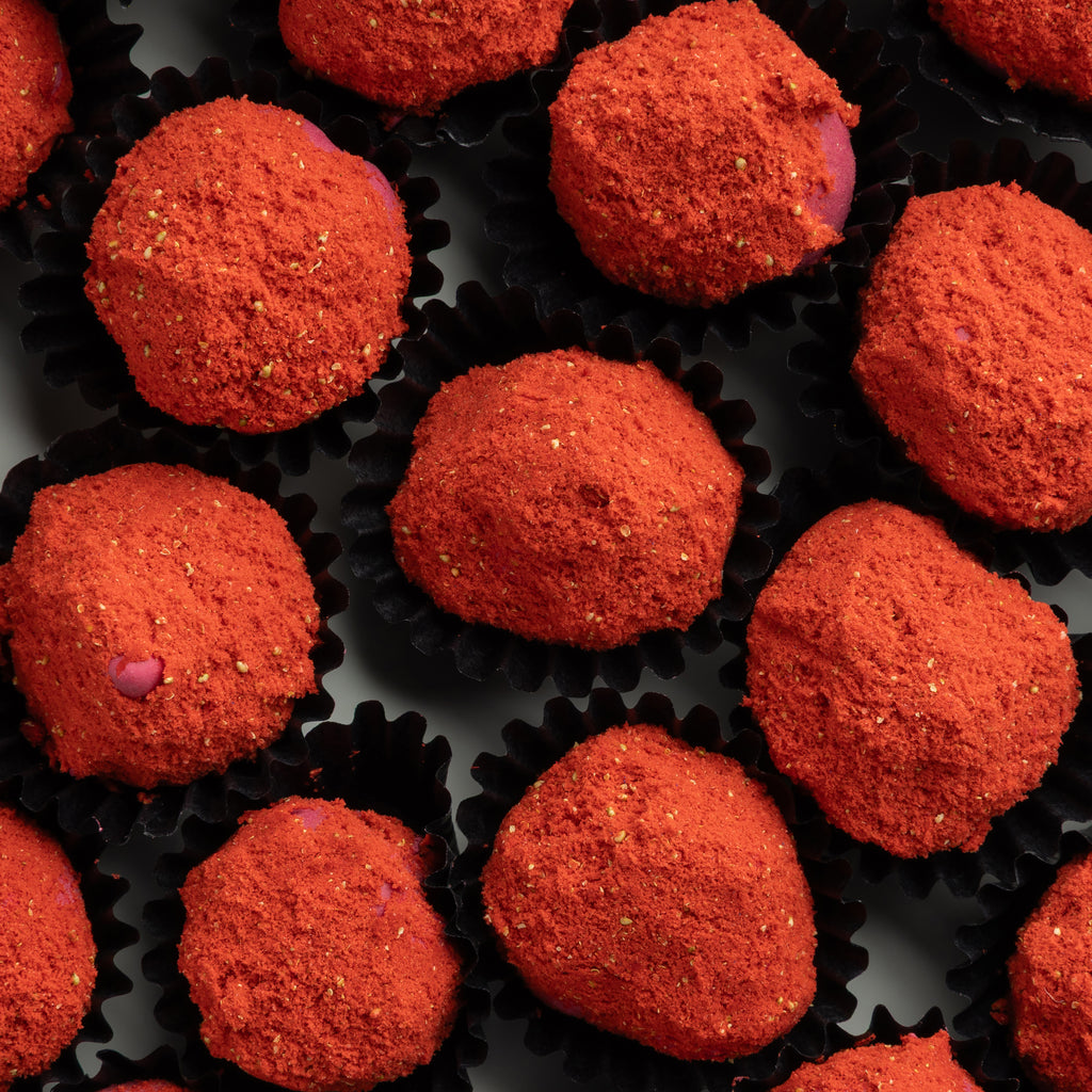 Closeup of strawberry-coated fig in combo