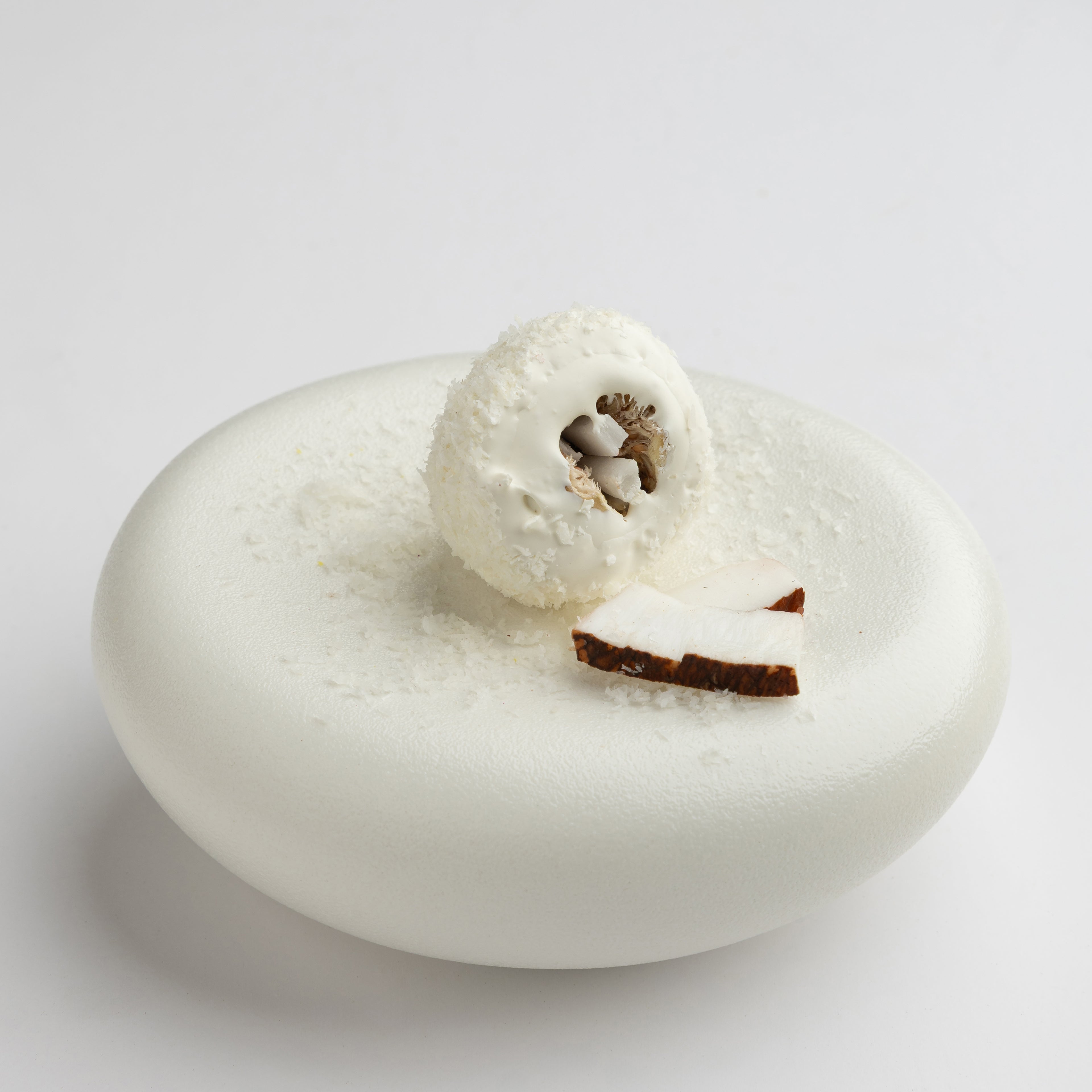 Single coconut fig bite closeup
